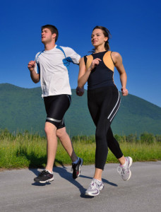 young couple running