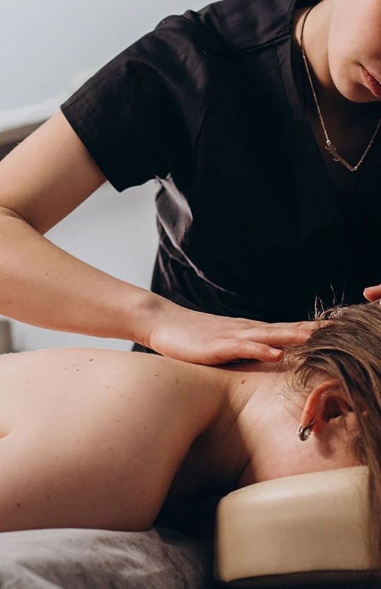 massage therapist in Kamloops helping a client